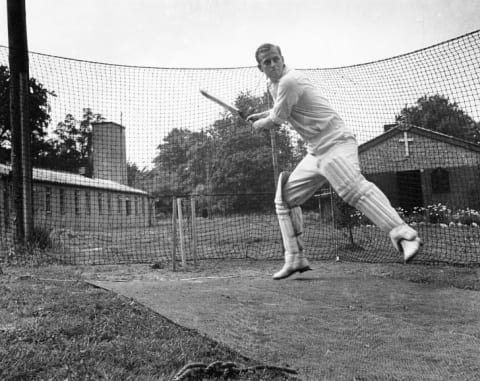 Philip Mountbatten batting at the nets during cricket practice while in the Royal Navy in 1947.