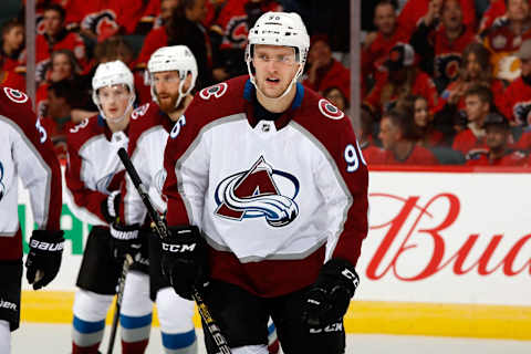 CALGARY, AB – APRIL 19: Mikko Rantanen #96 and teammates of the Colorado Avalanche celebrate a goal against the Calgary Flames in Game Five of the Western Conference First Round during the 2019 NHL Stanley Cup Playoffs on April 19, 2019 at the Scotiabank Saddledome in Calgary, Alberta, Canada. (Photo by Gerry Thomas/NHLI via Getty Images)