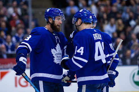 TORONTO, ON – FEBRUARY 6: Jake Muzzin #8 of the Toronto Maple Leafs talks to Morgan Rielly #44 at an NHL game against the Ottawa Senators during the third period at the Scotiabank Arena on February 6, 2019 in Toronto, Ontario, Canada. (Photo by Kevin Sousa/NHLI via Getty Images)