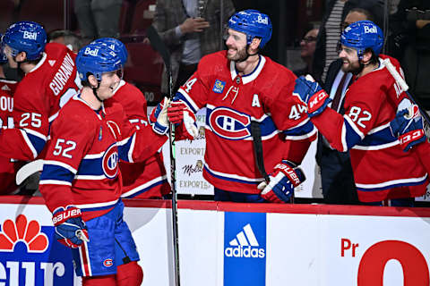 MONTREAL, CANADA – APRIL 13: Justin Barron #52 of the Montreal Canadiens celebrates his goal with teammates Joel Armia #40 and Frederic Allard #82 on the bench during the third period against the Boston Bruins at Centre Bell on April 13, 2023 in Montreal, Quebec, Canada. The Boston Bruins defeated the Montreal Canadiens 5-4. (Photo by Minas Panagiotakis/Getty Images)