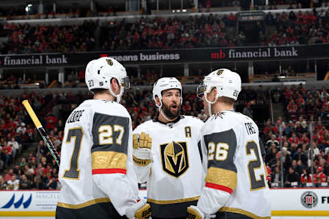 CHICAGO, IL – JANUARY 12: Deryk Engelland #5 of the Vegas Golden Knights talks with teammates Shea Theodore #27 and Paul Stastny #26 in the first period against the Chicago Blackhawks at the United Center on January 12, 2019 in Chicago, Illinois. (Photo by Bill Smith/NHLI via Getty Images)