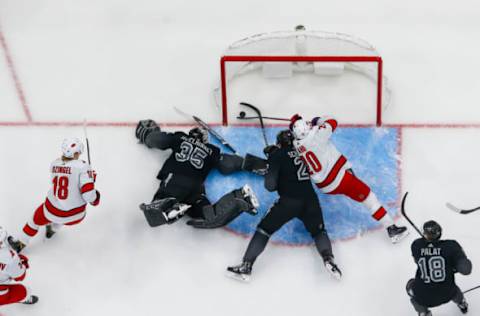 TAMPA, FL – NOVEMBER 30: Goalie Curtis McElhinney #35 of the Tampa Bay Lightning gives up a goal against Sebastian Aho #20 and the Carolina Hurricanes during the first period at Amalie Arena on November 30, 2019 in Tampa, Florida. (Photo by Scott Audette/NHLI via Getty Images)