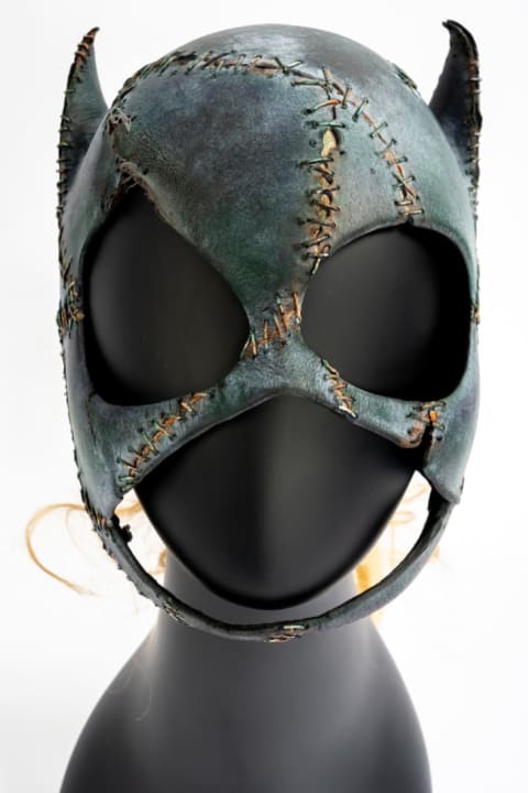 The Catwoman mask from 1992's Batman Returns shows battle damage.