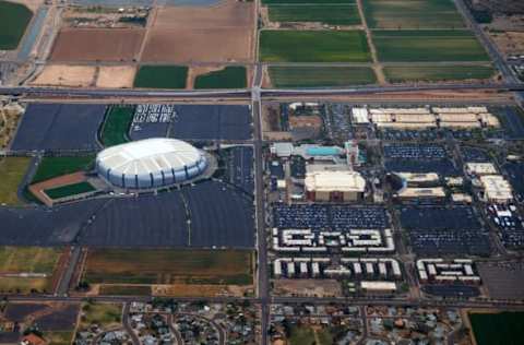 Apr 10, 2016; Glendale, AZ, USA; Aerial view of University of Phoenix Stadium (left), home of the Arizona Cardinals NFL football team. Also visible is the Gila River Arena in the Westgate Entertainment District , home of the Arizona Coyotes NHL hockey team. Mandatory Credit: Mark J. Rebilas-USA TODAY Sports