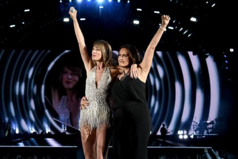 Taylor Swift performs onstage with actress Mariska Hargitay during The 1989 World Tour on June 13, 2015 at Lincoln Financial Field in Philadelphia.