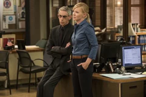 Richard Belzer and Kelli Giddish in Law & Order: Special Victims Unit.