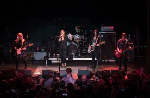 L to R: Charlotte Caffey, Belinda Carlisle, Gina Schock, Kathy Valentine, and Jane Wiedlin of The Go-Go's perform at New York City's Bowery Ballroom in 2018.