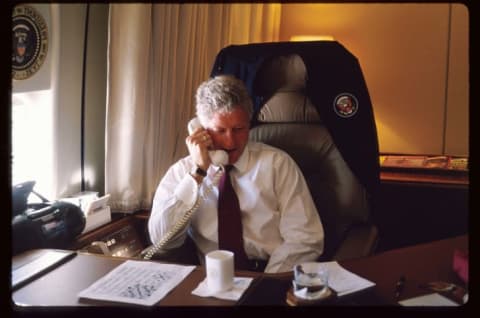 President Bill Clinton aboard Air Force One in November 1997.