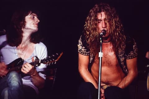 (L to R) Led Zeppelin's John Paul Jones and Robert Plant live at Nihon Budokan, Tokyo, in September 1971.