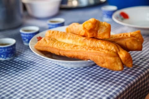 When the first youtiao was created, the two pieces of dough were human-shaped.