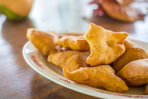 Mandazi is triangular shaped.