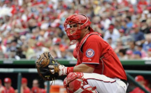 WASHINGTON, DC – SEPTEMBER 25, 2011: Catcher Wilson Ramos #3 of the Washington Nationals looks towards the Atlanta Braves’ dugout between batters during the top of the seventh inning of a game on September 25, 2011 at Nationals Park in Washington, DC.11-10745802011 Diamond Images