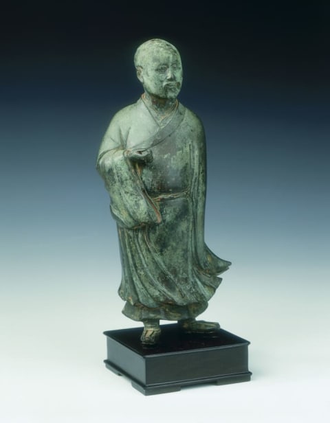 A bronze statue of a 16th-century Chinese official.