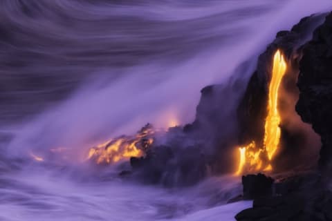 Lava pouring into the ocean in Kilauea, Hawaii.