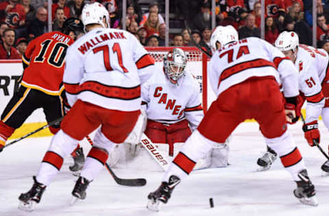 CALGARY, AB – DECEMBER 14: Carolina Hurricanes Goalie James Reimer (47) watches the puck during the second period of an NHL game where the Calgary Flames hosted the Carolina Hurricanes on December 14, 2019, at the Scotiabank Saddledome in Calgary, AB. (Photo by Brett Holmes/Icon Sportswire via Getty Images)