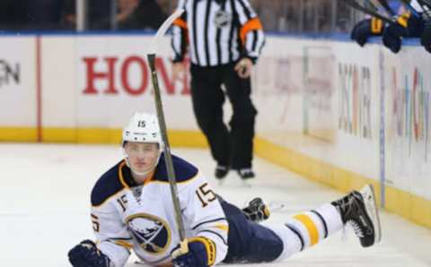 NEW YORK, NY – JANUARY 25: Jack Eichel #15 of the Buffalo Sabres falls and loses the puck against the New York Rangers at Madison Square Garden on January 25, 2016 in New York City. (Photo by Elsa/Getty Images)