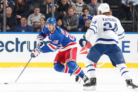 NEW YORK, NY – DECEMBER 20: Chris Kreider #20 of the New York Rangers skates with the puck against Kasperi Kapanen #24 of the Toronto Maple Leafs at Madison Square Garden on December 20, 2019 in New York City. (Photo by Jared Silber/NHLI via Getty Images)