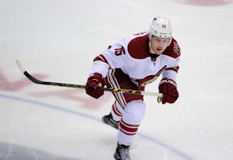 Apr 9, 2015; Vancouver, British Columbia, CAN; Arizona Coyotes forward Henrik Samuelsson (15) skates against the Vancouver Canucks during the second period at Rogers Arena. The Vancouver Canucks won 5-0. Mandatory Credit: Anne-Marie Sorvin-USA TODAY Sports