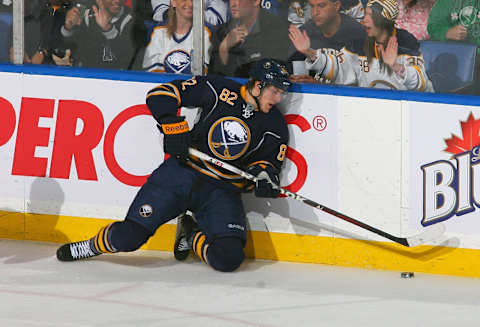 BUFFALO, NY – APRIL 03: Marcus Foligno #82 of the Buffalo Sabres controls the puck from his knees in the second period at First Niagara Center on April 3, 2012 in Buffalo, New York. (Photo by Rick Stewart/Getty Images)