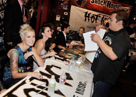 (L-R) Jennifer's Body writer Diablo Cody and stars Megan Fox, Johnny Simmons, Adam Brody, and Amanda Seyfried at a Los Angeles fan event in 2009.