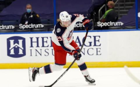 Apr 1, 2021; Tampa, Florida, USA; Columbus Blue Jackets right wing Patrik Laine (29) shoots against the Tampa Bay Lightning during the second period at Amalie Arena. Mandatory Credit: Kim Klement-USA TODAY Sports