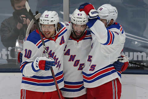 New York Rangers center Colin Blackwell (43) celebrates his goal against the New York Islanders with left wing Artemi Panarin (10) and center Ryan Strome (16) .nCredit: Brad Penner-USA TODAY Sports