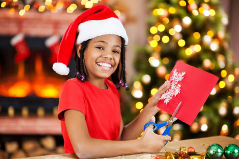 You can use your paper snowflakes to decorate homemade holiday cards.