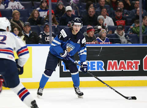 BUFFALO, NY – DECEMBER 31: Janne Kuokkanen #9. (Photo by Kevin Hoffman/Getty Images)