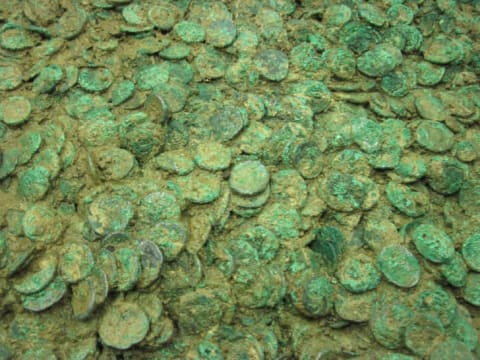 Grouville Hoard, found in Jersey, while undergoing cleaning and investigation in 2012.