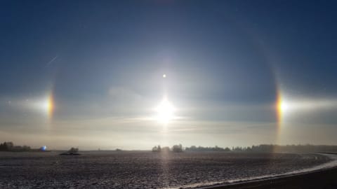 Sundogs around a winter sunset.