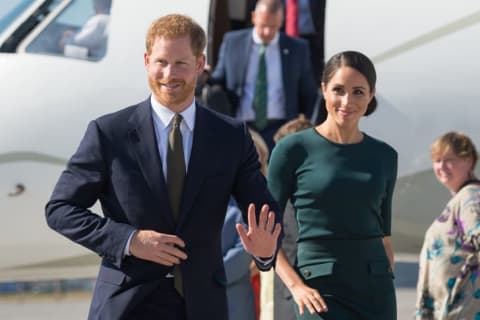 Meghan, Duchess of Sussex and Prince Harry, Duke of Sussex arrive at the airport in July 2018.