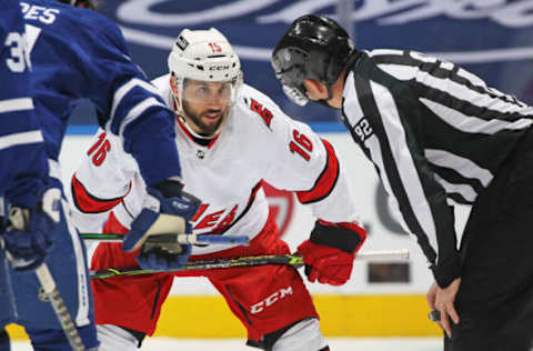 TORONTO, ON – FEBRUARY 7: Linseman Mark Shewchyk #92 chats with Vincent Trocheck #16 of the Carolina Hurricanes prior to a faceoff against the Toronto Maple Leafs during an NHL game at Scotiabank Arena on February 7, 2022 in Toronto, Ontario, Canada. The Maple Leafs defeated the Hurricanes 4-3 in overtime. (Photo by Claus Andersen/Getty Images)