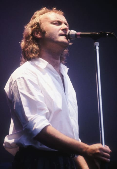 Phil Collins performs in concert in 1985.