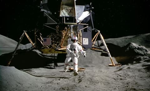 Tom Hanks imagines walking on the Moon in Apollo (1995).