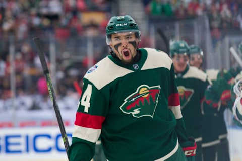 Feb 21, 2016; Minneapolis, MN, USA; Minnesota Wild defenseman Matt Dumba (24) celebrates his goal in the first period against the Chicago Blackhawks during a Stadium Series hockey game at TCF Bank Stadium. Mandatory Credit: Brace Hemmelgarn-USA TODAY Sports