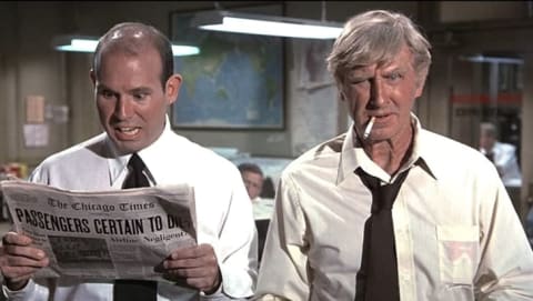 Stephen Stucker and Lloyd Bridges in Airplane! (1980).