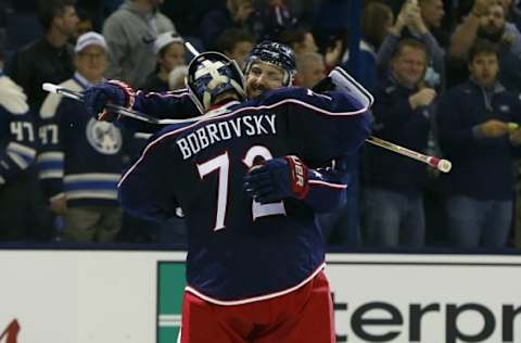 NHL Power Rankings: Columbus Blue Jackets left wing Nick Foligno (71) and goalie Sergei Bobrovsky (72) celebrate the win after the game at Nationwide Arena. Columbus defeated Tampa Bay 5-1. Mandatory Credit: Russell LaBounty-USA TODAY Sports