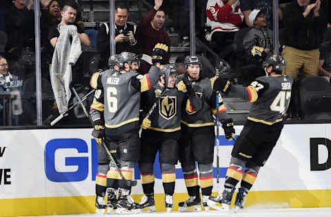 LAS VEGAS, NV – OCTOBER 13: (L-R) Reilly Smith #19, Colin Miller #6, Jonathan Marchessault #81, Oscar Lindberg #24 and Luca Sbisa #47 of the Vegas Golden Knights celebrate after scoring a goal against the Detroit Red Wings during the game at T-Mobile Arena on October 13, 2017 in Las Vegas, Nevada. (Photo by Jeff Bottari/NHLI via Getty Images)