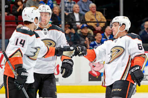 VANCOUVER, BC: Adam Henrique #14 of the Anaheim Ducks is congratulated by Kevin Roy #63 after scoring during their NHL game against the Vancouver Canucks on January 2, 2018. (Photo by Jeff Vinnick/NHLI via Getty Images)