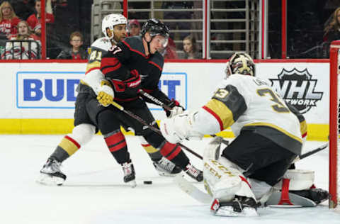 RALEIGH, NC – FEBRUARY 01: Vegas Golden Knights Center Pierre-Edouard Bellemare (41) defends against Carolina Hurricanes Left Wing Andrei Svechnikov (37) driving to the net during a game between the Las Vegas Golden Knights and the Carolina Hurricanes on February 1, 2019, at the PNC Arena in Raleigh, NC. (Photo by Greg Thompson/Icon Sportswire via Getty Images)