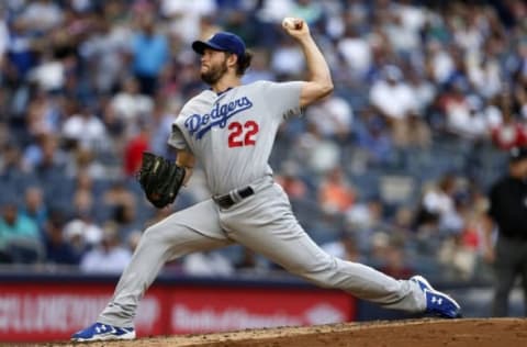 Sep 14, 2016; Bronx, NY, USA; Los Angeles Dodgers starting pitcher Clayton Kershaw (22) delivers a pitch during the second inning against the New York Yankees at Yankee Stadium. Mandatory Credit: Adam Hunger-USA TODAY Sports