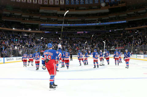 NEW YORK, NY – MARCH 29: The New York Rangers salute the crowd after defeating the St. Louis Blues at Madison Square Garden on March 29, 2019 in New York City. (Photo by Jared Silber/NHLI via Getty Images)