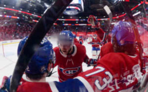 Jun 7, 2021; Montreal, Quebec, CAN; Montreal Canadiens forward Tyler Toffoli (73) reacts with teammates including forward Cole Caufield (22) and forward Corey Perry (94) after scoring the game and series winning goal against the Winnipeg Jets during the overtime period in game four of the second round of the 2021 Stanley Cup Playoffs at the Bell Centre. Mandatory Credit: Eric Bolte-USA TODAY Sports