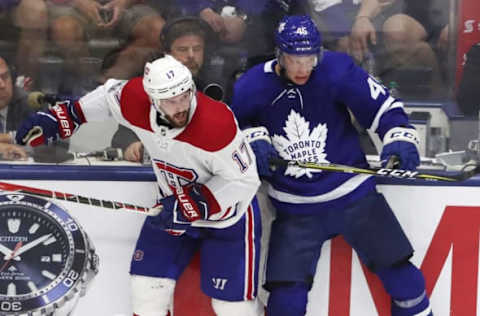 TORONTO, ON- SEPTEMBER 25 – Toronto Maple Leafs center Miro Aaltonen (45) and Montreal Canadiens center Torrey Mitchell (17) collide along the boards as the Toronto Maple Leafs play the Montreal Canadiens in NHL pre-season action at the Ricoh Coliseum in Toronto. September 25, 2017. (Steve Russell/Toronto Star via Getty Images)