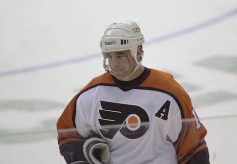 19 Apr 2001: John LeClair #10 of the Philadelphia Flyers leaves the game after being hit above the eye in the first period of Game 5 of the first round of the NHL playoffs against the Buffalo Sabres at the First Union Center in Philadelphia, Pennsylvania. Mandatory Credit: Ezra Shaw/ALLSPORT