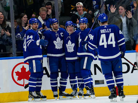 Mar 27, 2022; Toronto, Ontario, CAN; Toronto Maple Leafs forward Auston Matthews (34) and forward Mitchell Marner (16) and forward William Nylander (88) and defenseman Morgan Rielly (44)  . Mandatory Credit: John E. Sokolowski-USA TODAY Sports