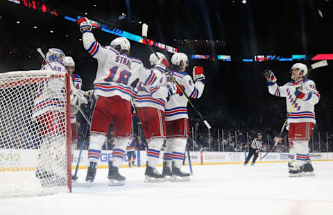 The New York Rangers celebrate their 3-2 victory over the New York Islanders