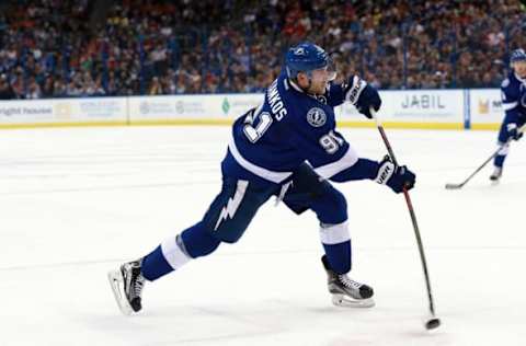 Mar 22, 2016; Tampa, FL, USA; Tampa Bay Lightning center Steven Stamkos (91) passes the puck against the Detroit Red Wings during the second period at Amalie Arena. Mandatory Credit: Kim Klement-USA TODAY Sports