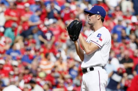 October 6, 2016; Arlington, TX, USA; Texas Rangers starting pitcher Hamels (35) before throwing in the first inning against the Toronto Blue Jays during game one of the 2016 ALDS playoff baseball game at Globe Life Park in Arlington. Mandatory Credit: Tim Heitman-USA TODAY Sports