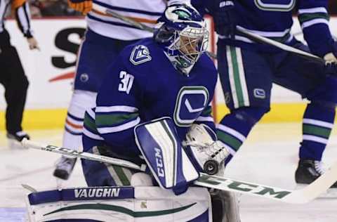 NHL Power Rankings: Vancouver Canucks goaltender Ryan Miller (30) stops a shot on net by the Edmonton Oilers during the second period at Rogers Arena. Mandatory Credit: Anne-Marie Sorvin-USA TODAY Sports